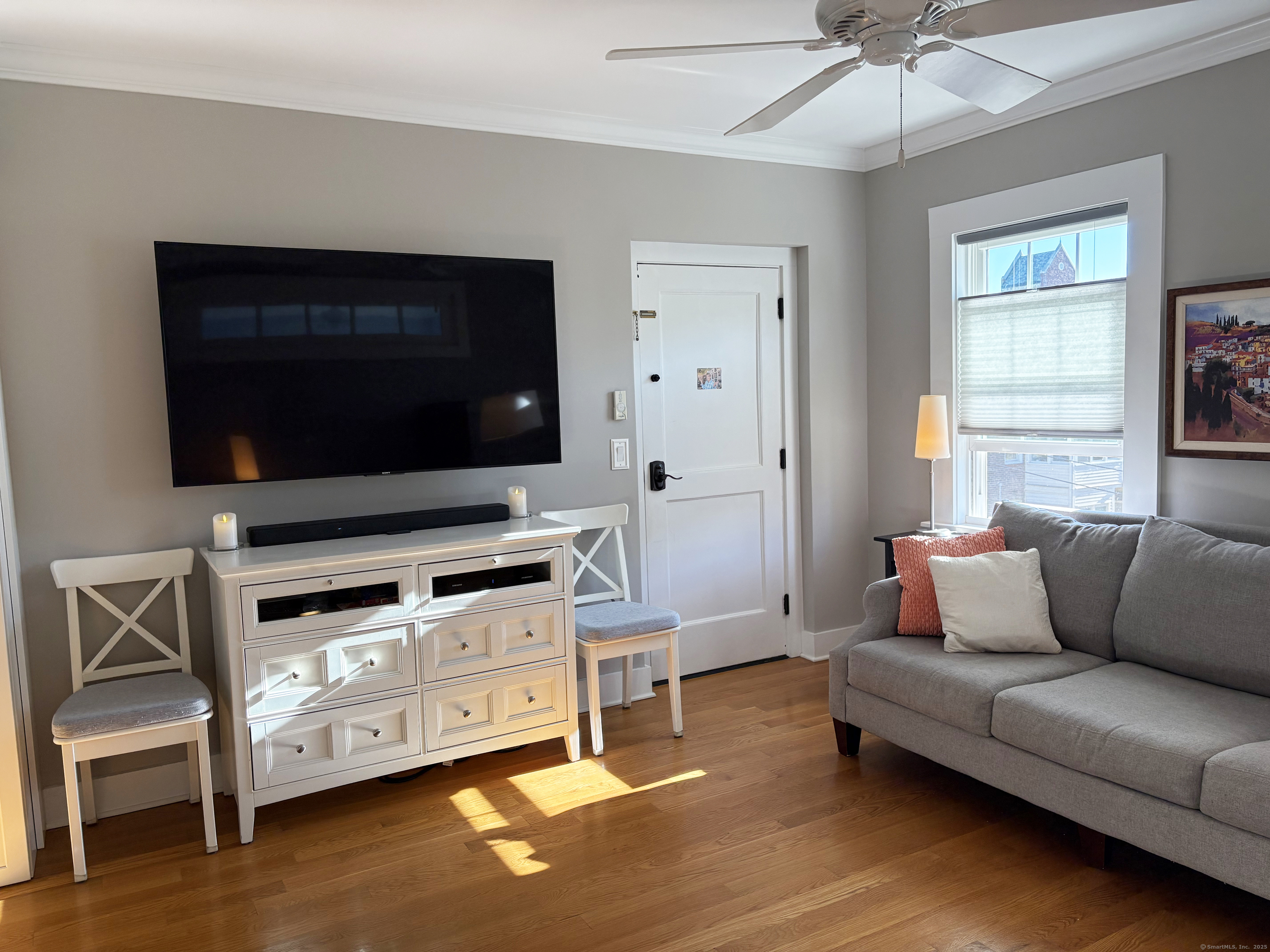 20 Haddon Street, Unit 5 Bridgeport, CT 06605 - Photo 4 of 40 a living room with furniture and a flat screen tv