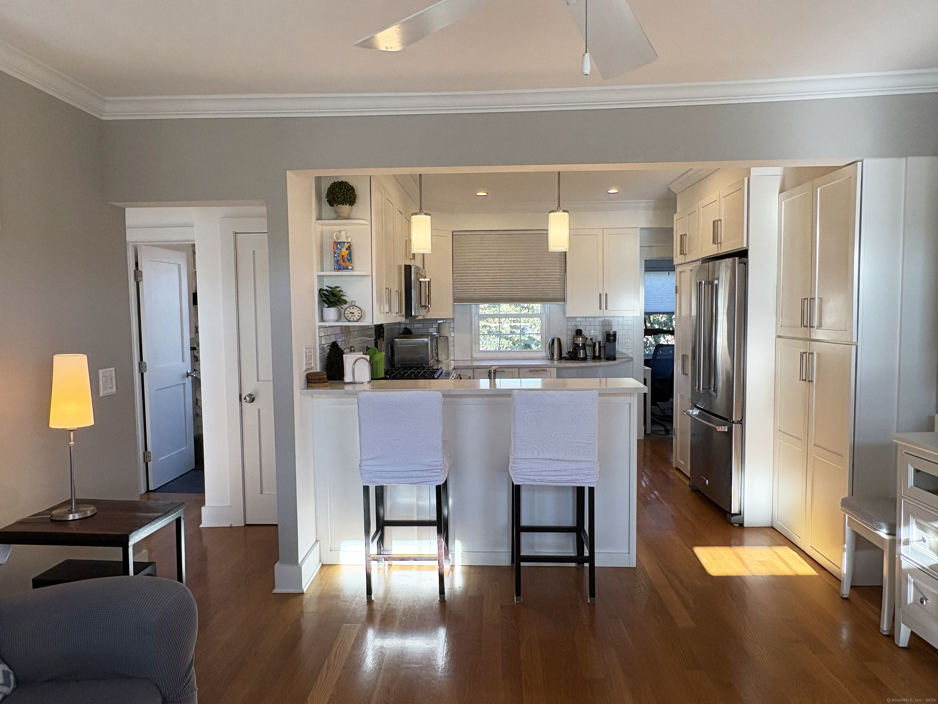 20 Haddon Street, Unit 5 Bridgeport, CT 06605 - Photo 8 of 40 a dining room with furniture and wooden floor