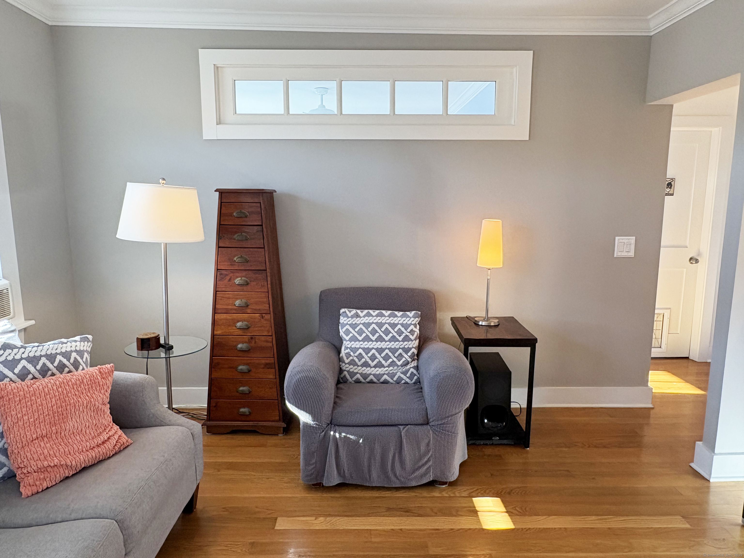 20 Haddon Street, Unit 5 Bridgeport, CT 06605 - Photo 10 of 40 a living room with furniture and a window
