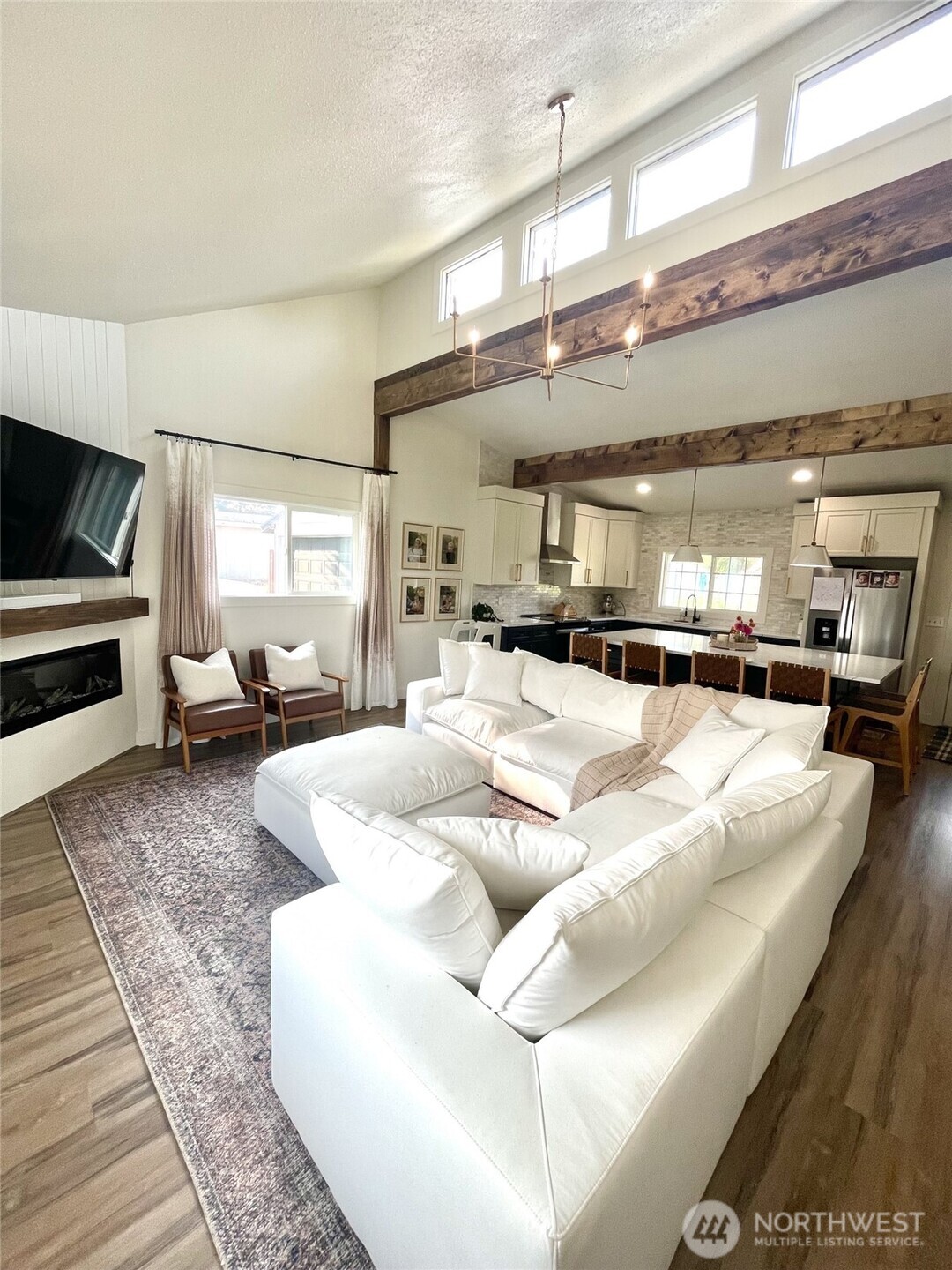 6694 Mae Valley Road Northeast Moses Lake, WA 98837 - Photo 2 of 26 a large white building with kitchen view