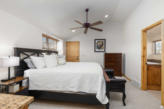 5168 Fairview Loop, Unit C604 Eden, UT 84310 - Photo 20 of 53 Bedroom with vaulted ceiling, light colored carpet, recessed lighting, and a ceiling fan