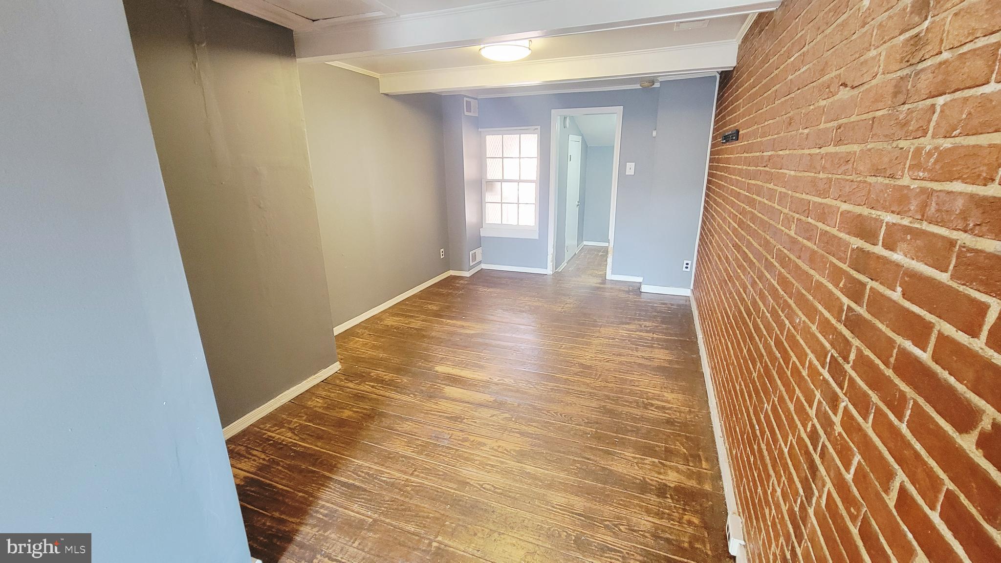 703 Tessier Street Baltimore, MD 21201 - Photo 14 of 19 3rd level bedroom