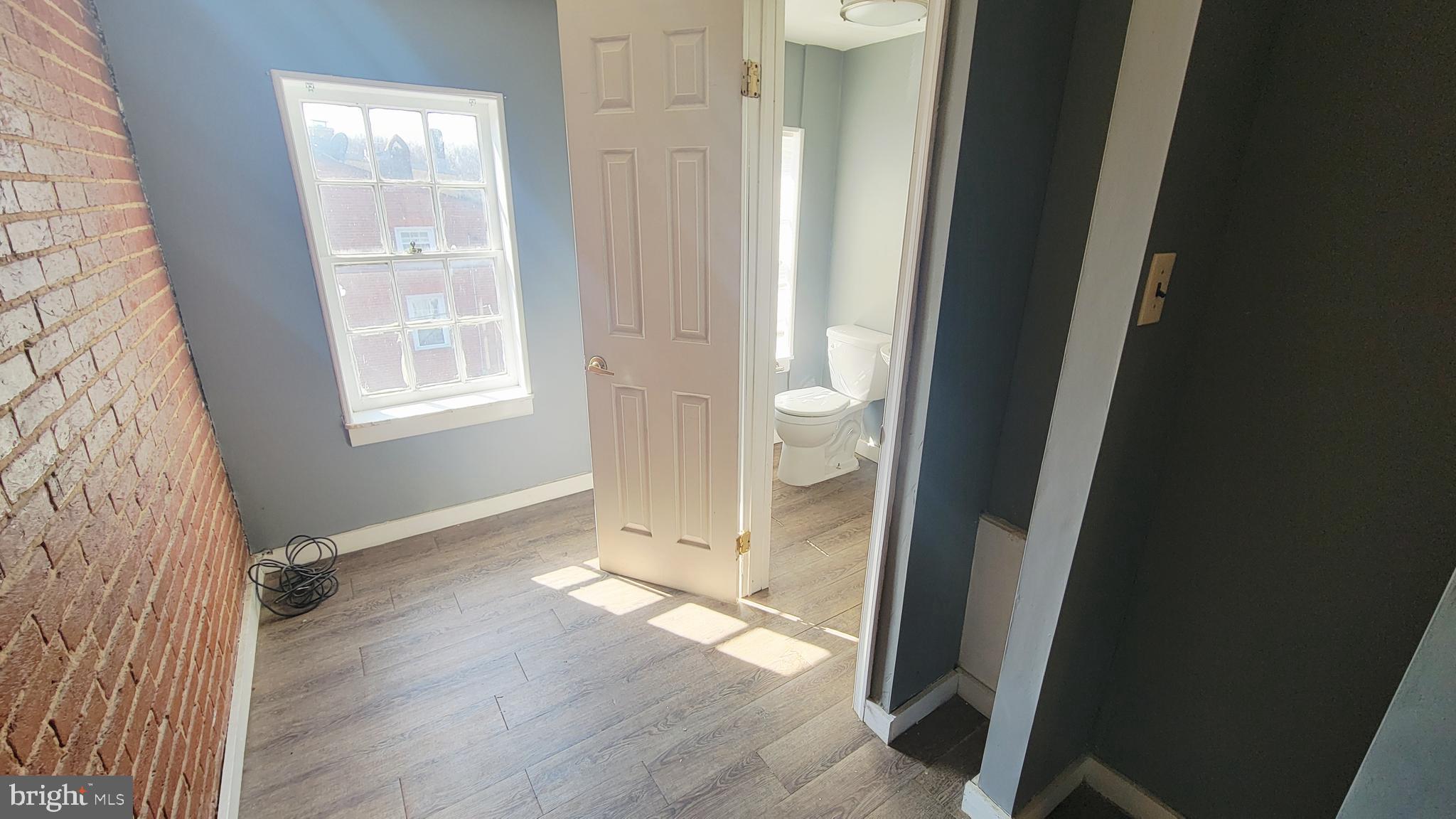 703 Tessier Street Baltimore, MD 21201 - Photo 15 of 19 Extra space to bathroom