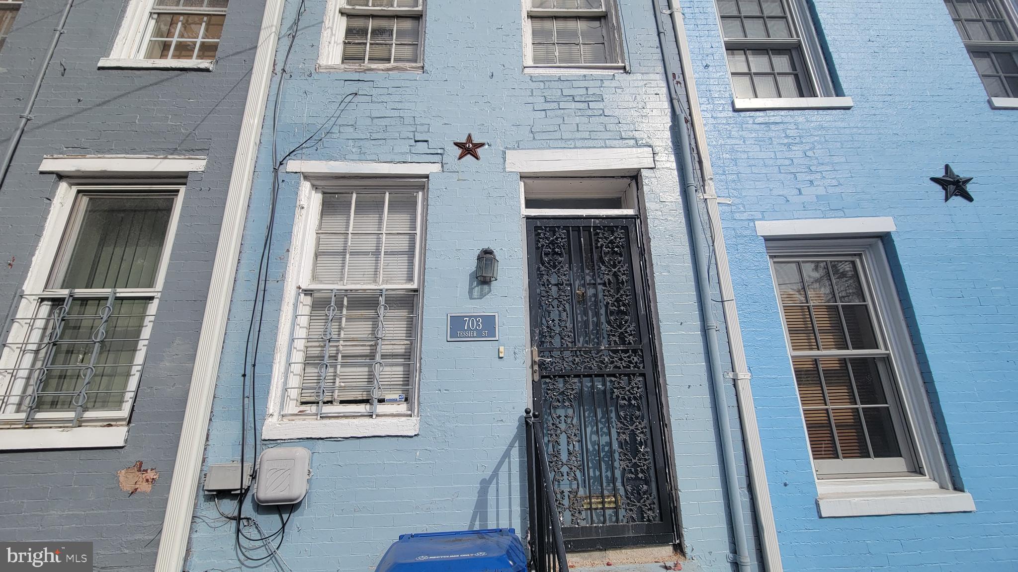 703 Tessier Street Baltimore, MD 21201 - Photo 2 of 19 Front exterior of 703 Tessier