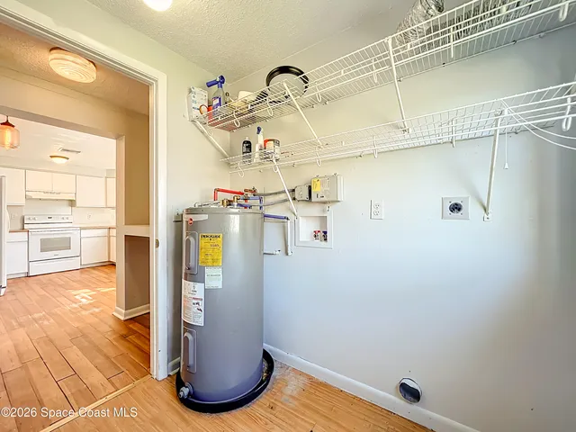 a view of a room with racks on the wall