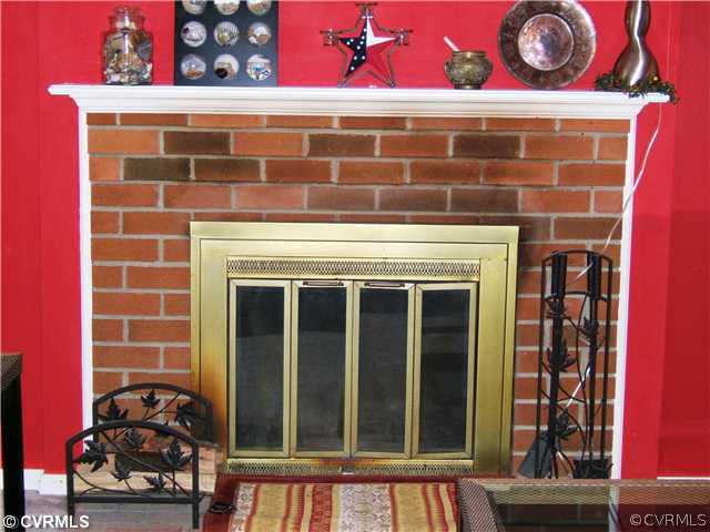 Living Room - Lovely Wood Burning Fireplace with B