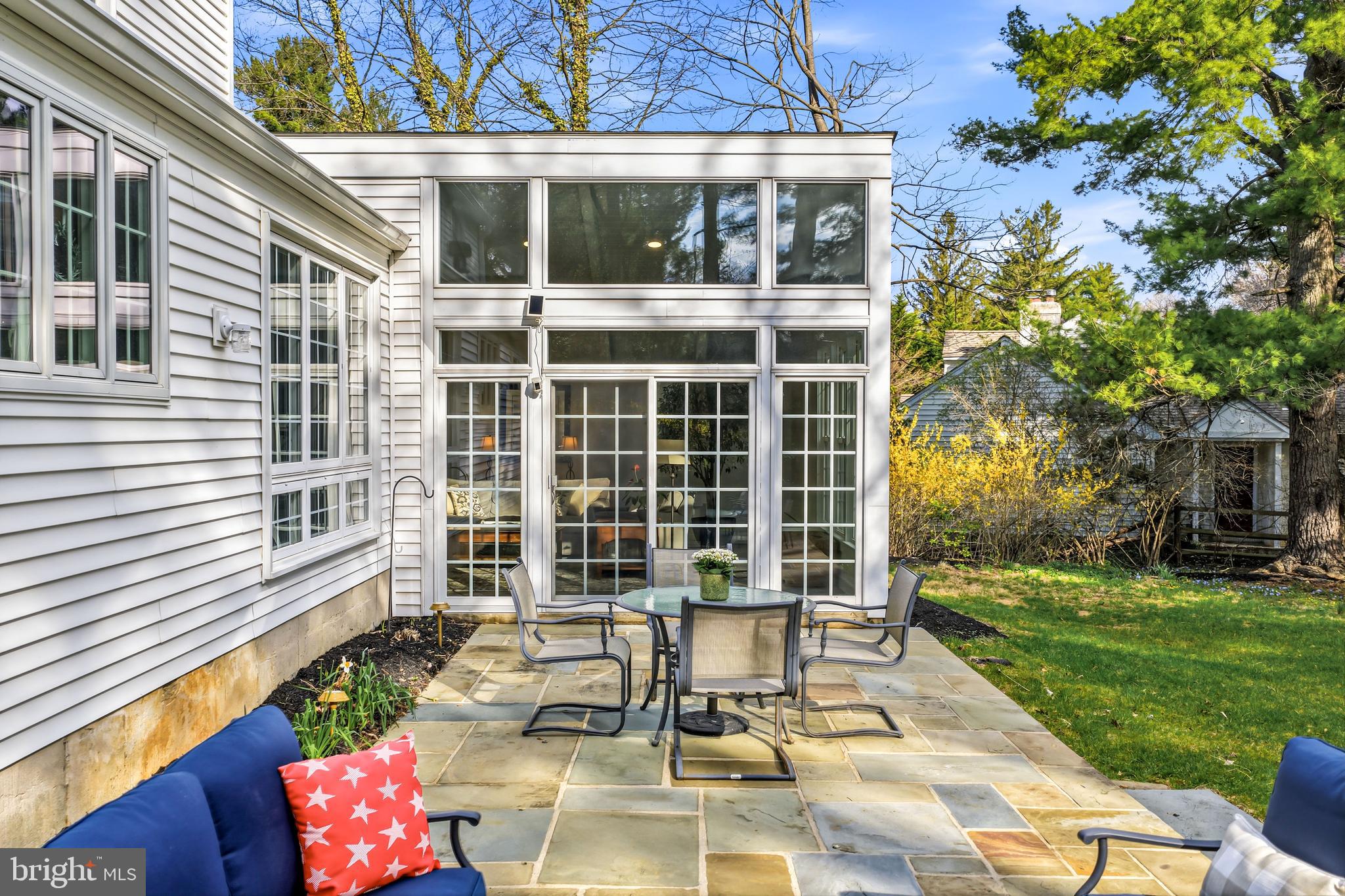 371 Margo Lane Berwyn, PA 19312 - Photo 24 of 68 a view of a patio with table and chairs and potted plants