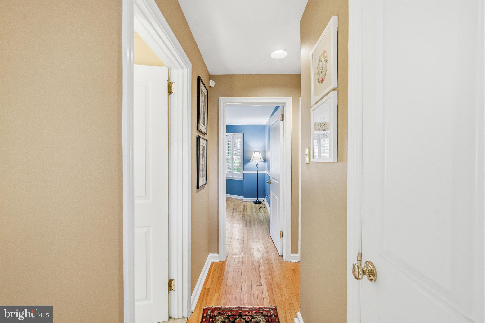 371 Margo Lane Berwyn, PA 19312 - Photo 29 of 68 a view of a hallway with wooden floor and staircase