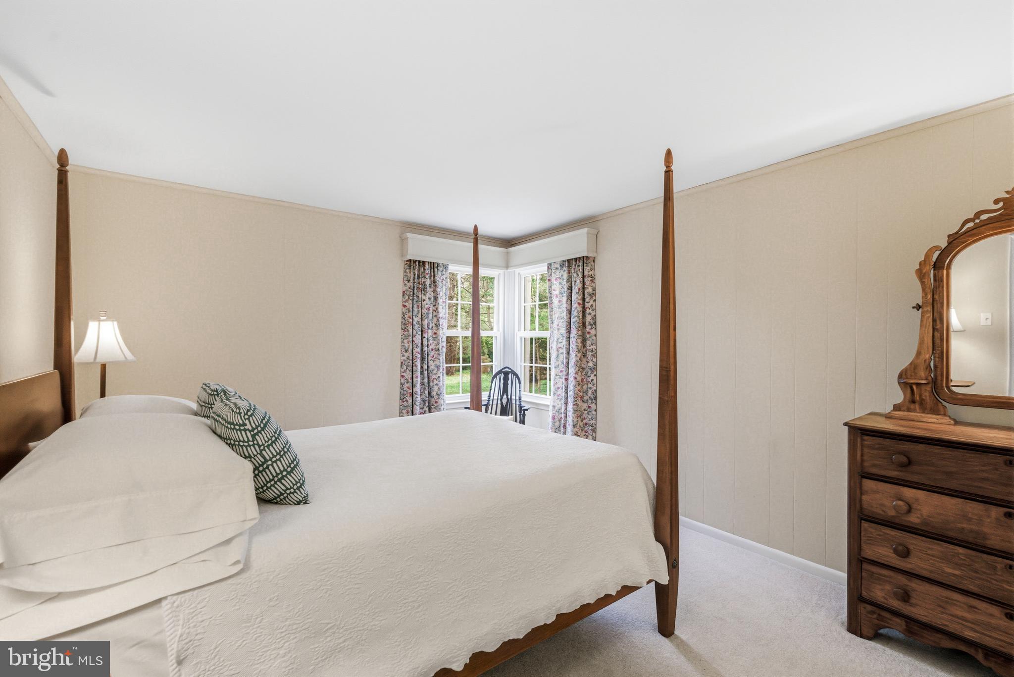 371 Margo Lane Berwyn, PA 19312 - Photo 31 of 68 a bedroom with a bed and a window