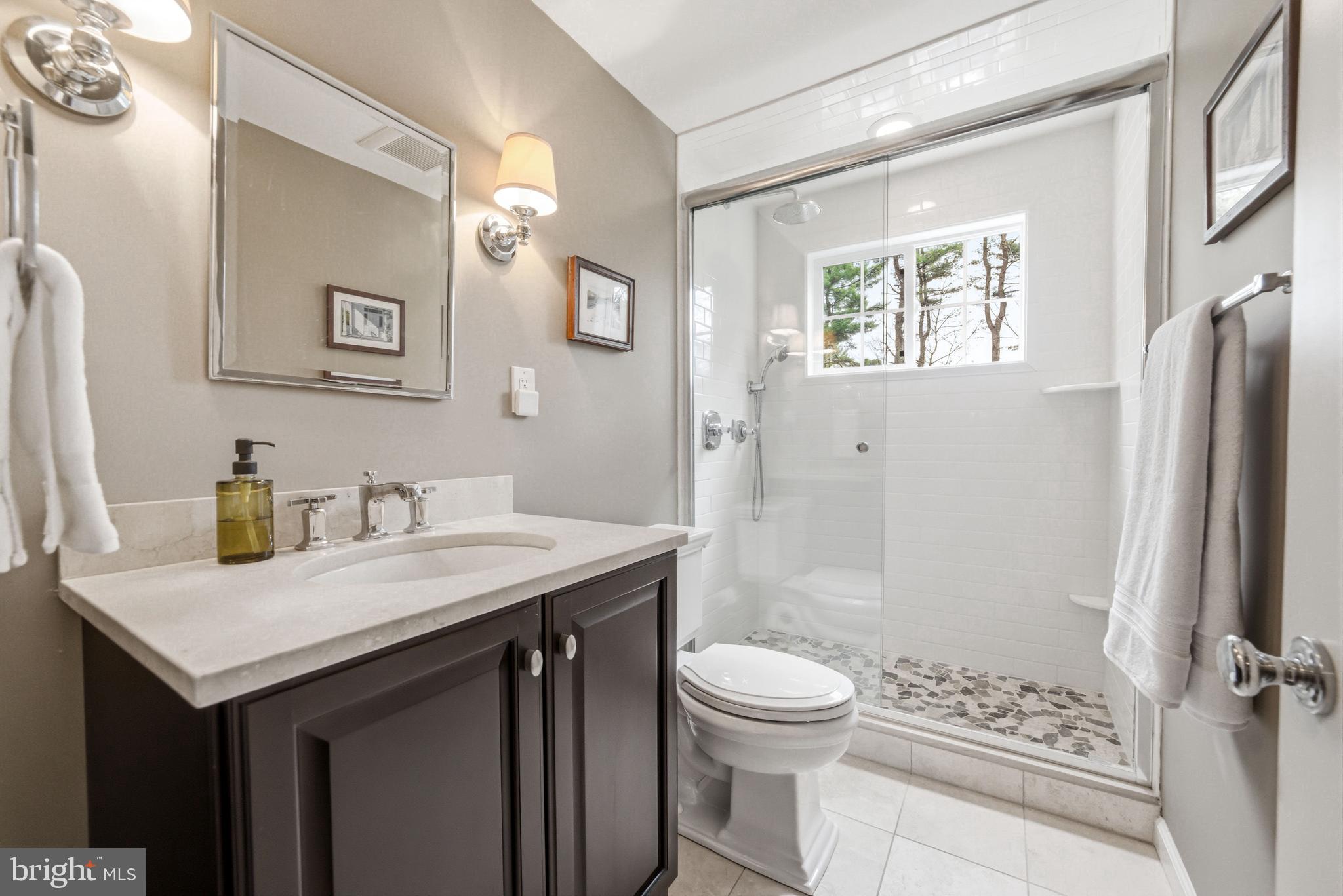371 Margo Lane Berwyn, PA 19312 - Photo 32 of 68 a bathroom with a sink a toilet and shower