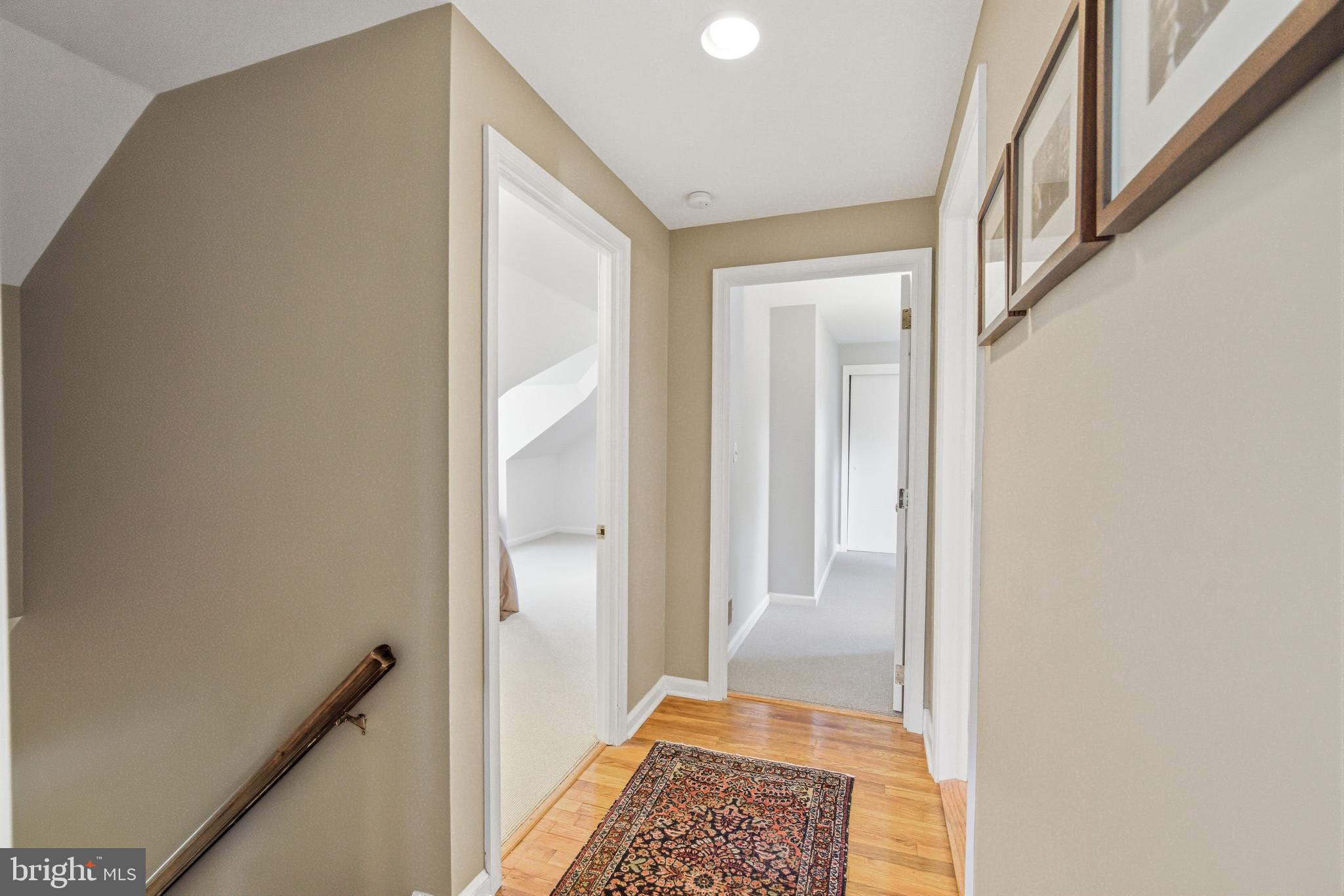 371 Margo Lane Berwyn, PA 19312 - Photo 34 of 68 a view of hallway with bathroom and wooden floor