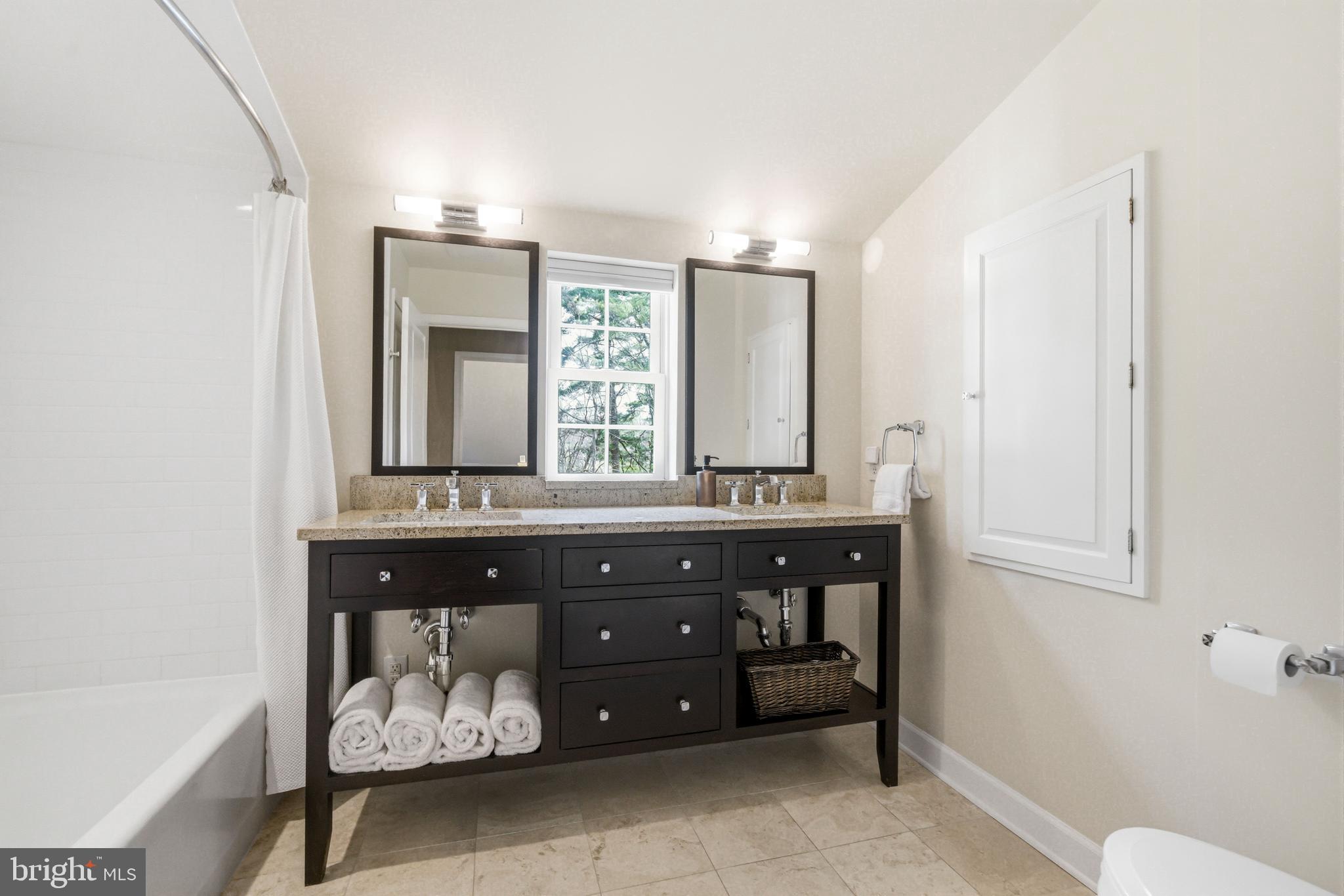 371 Margo Lane Berwyn, PA 19312 - Photo 39 of 68 a bathroom with a sink vanity and a mirror