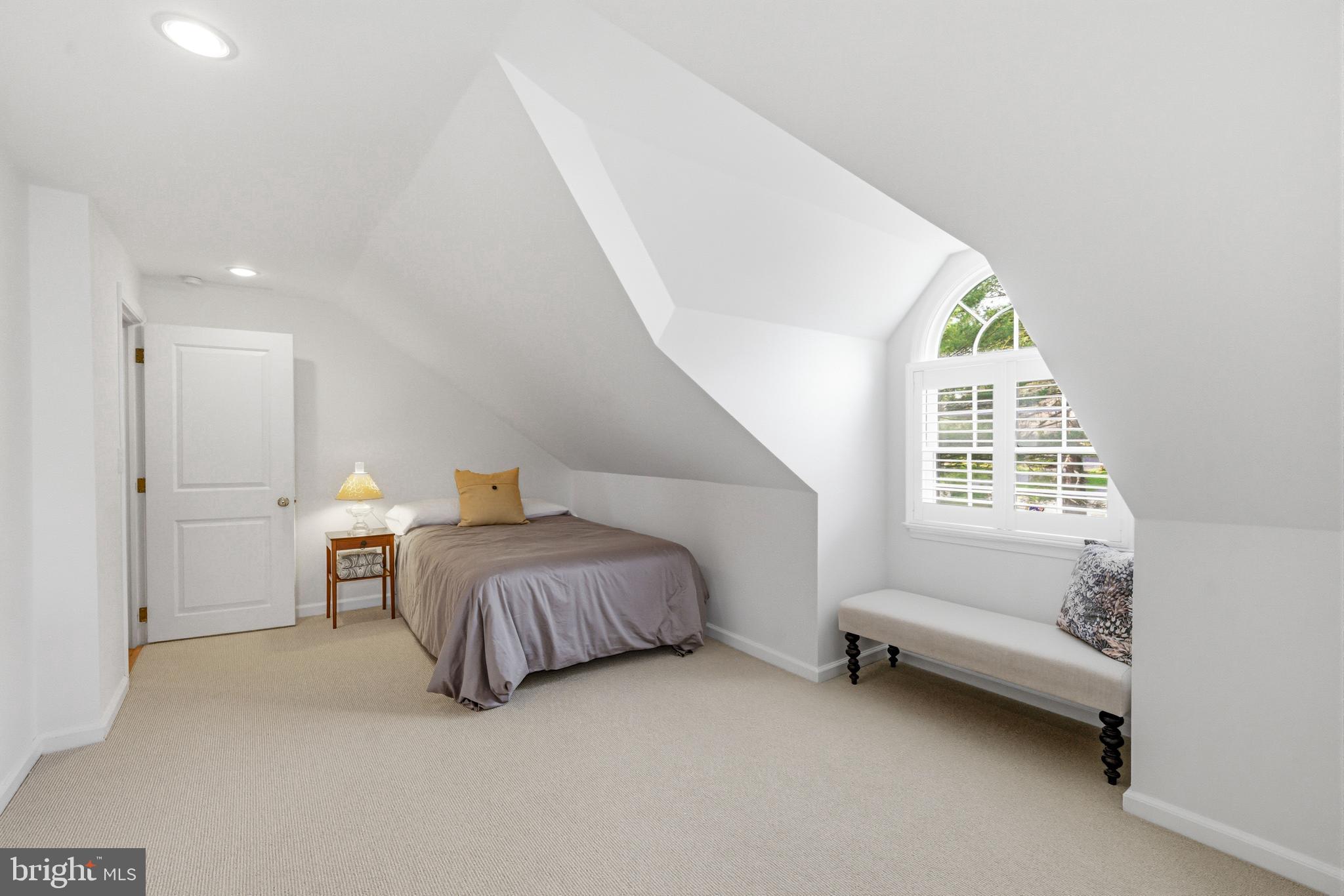 371 Margo Lane Berwyn, PA 19312 - Photo 44 of 68 a spacious bedroom with a bed and a window