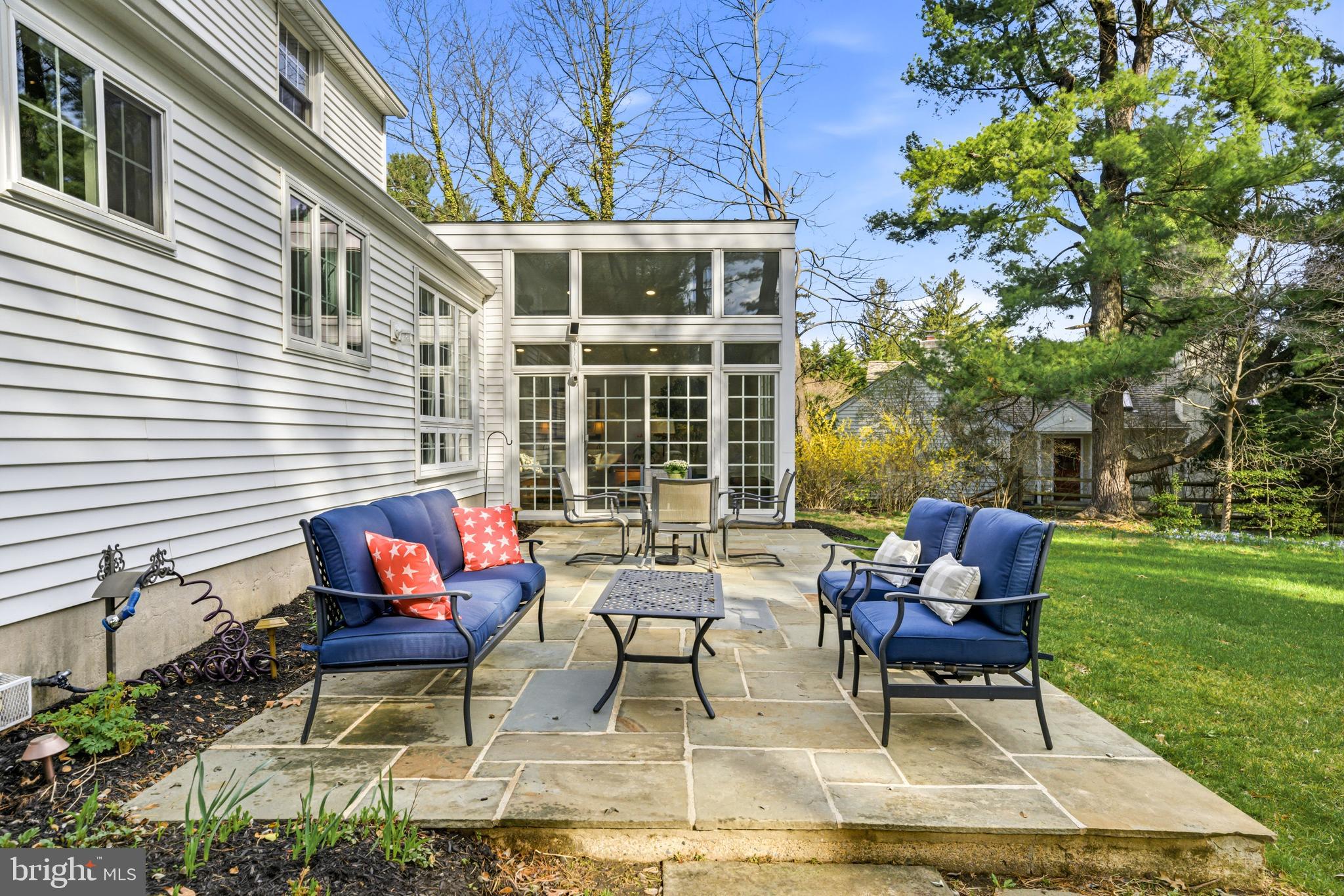 371 Margo Lane Berwyn, PA 19312 - Photo 51 of 68 a backyard of a house with outdoor seating