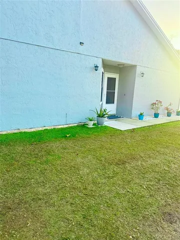 a view of a house with a big yard