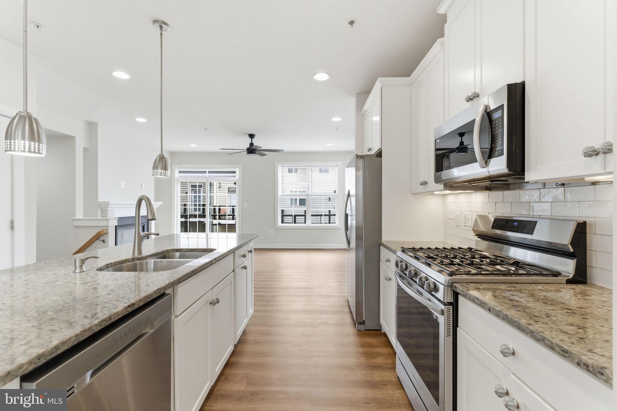 169 Kandinsky Loop Silver Spring, MD 20906 - Photo 23 of 67 Modern kitchen with sleek finishes.