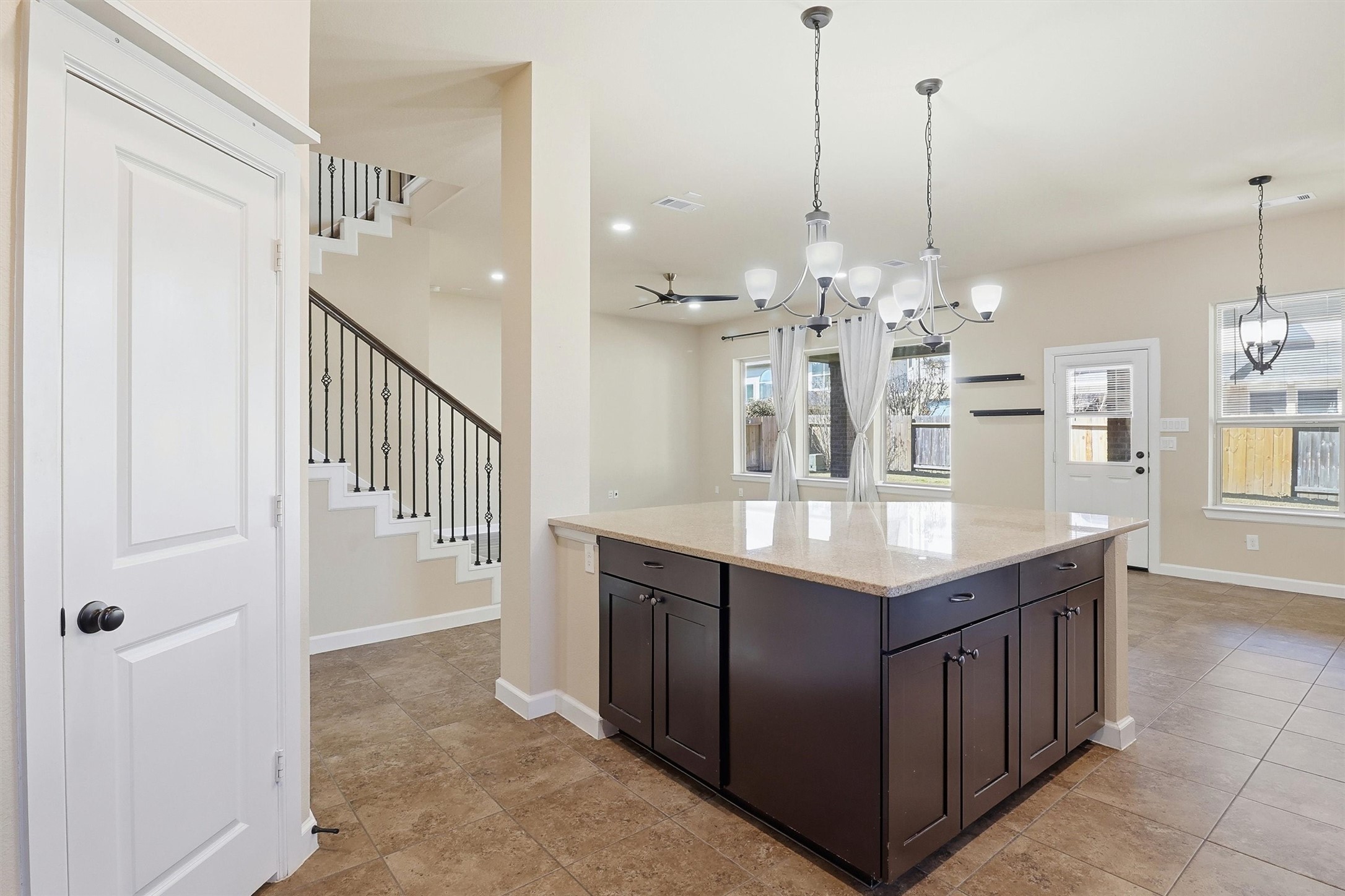 26202 Rustic Ranch Lane Katy, TX 77494 - Photo 12 of 50 Large island offers plenty of room for food prep and large diners.