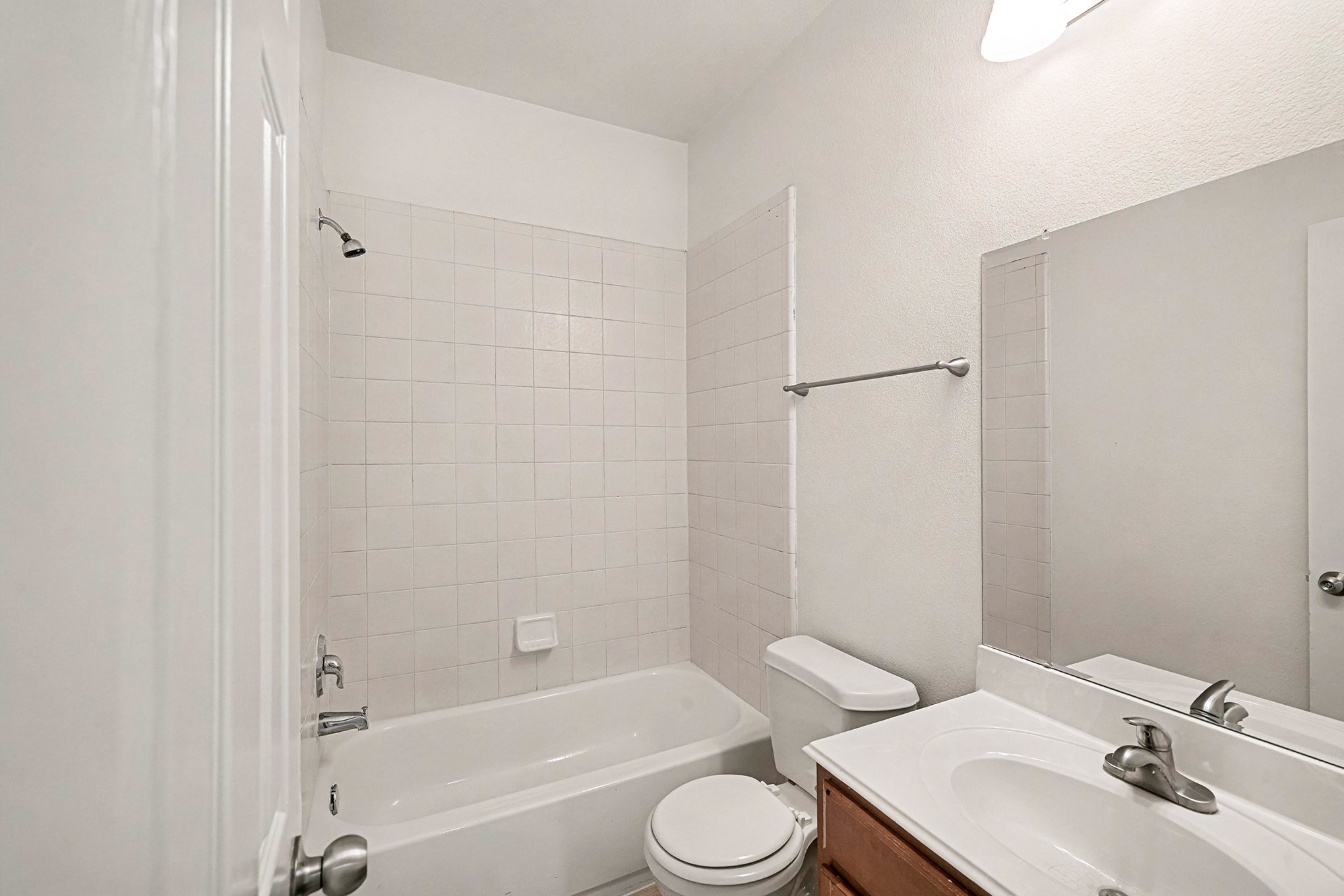 2710 Sleepy Knoll Drive Spring, TX 77373 - Photo 13 of 16 a bathroom with a sink toilet and bathtub