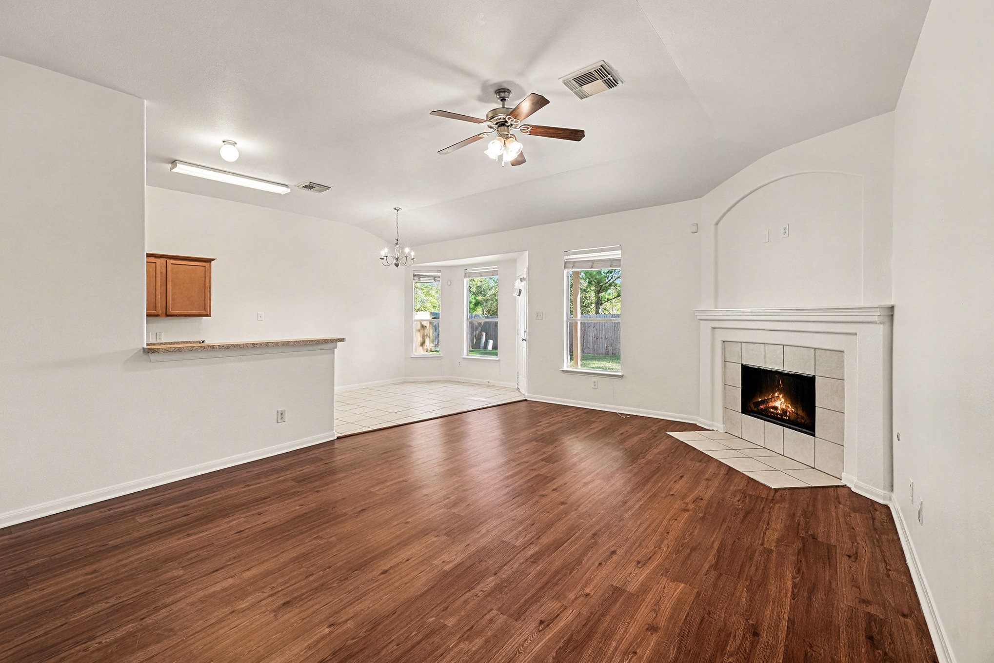 2710 Sleepy Knoll Drive Spring, TX 77373 - Photo 4 of 16 a view of an empty room with a fireplace and a window