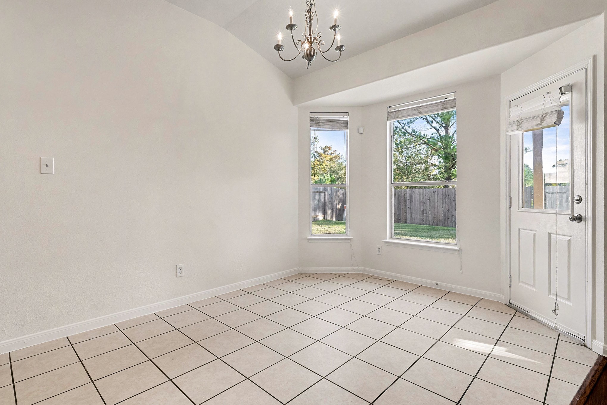 2710 Sleepy Knoll Drive Spring, TX 77373 - Photo 5 of 16 a view of an empty room with a window