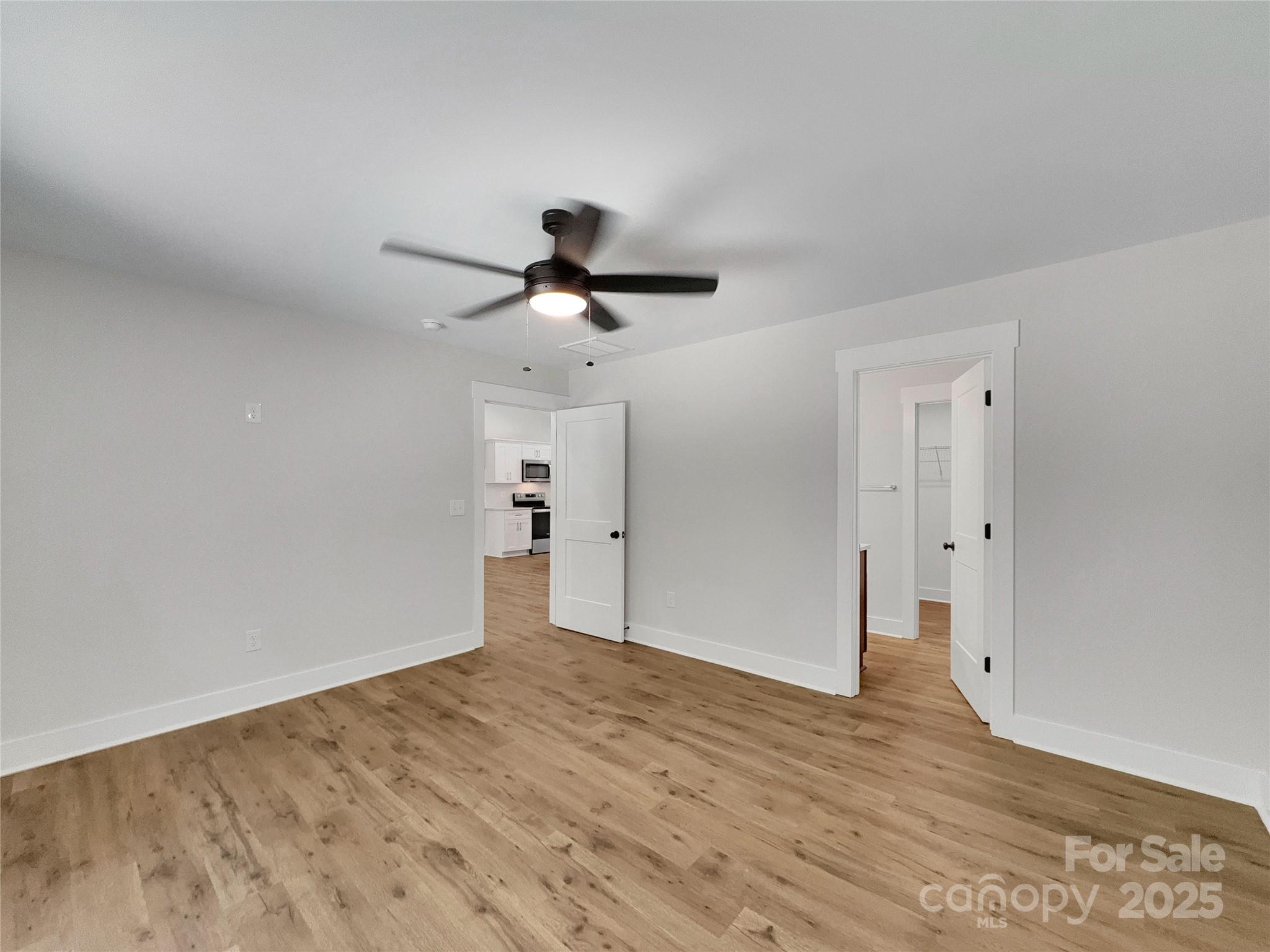 2330 Neill Road Lancaster, SC 29720 - Photo 22 of 39 a view of a big room with wooden floor and windows
