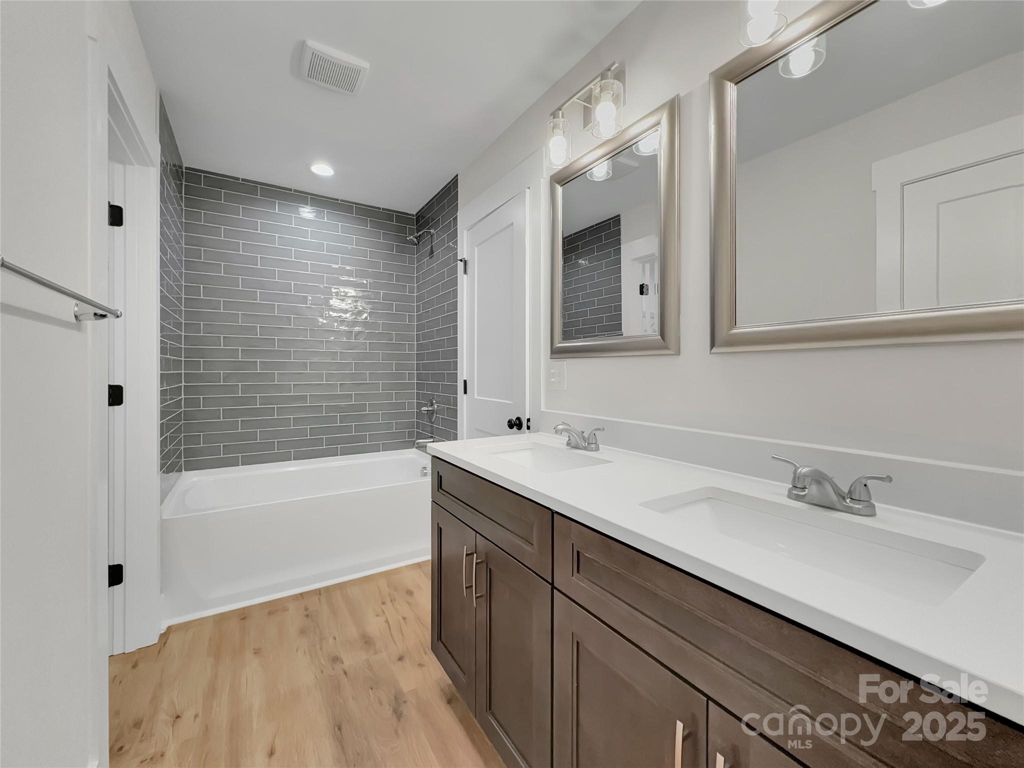 2330 Neill Road Lancaster, SC 29720 - Photo 24 of 39 a bathroom with a tub sink and mirror