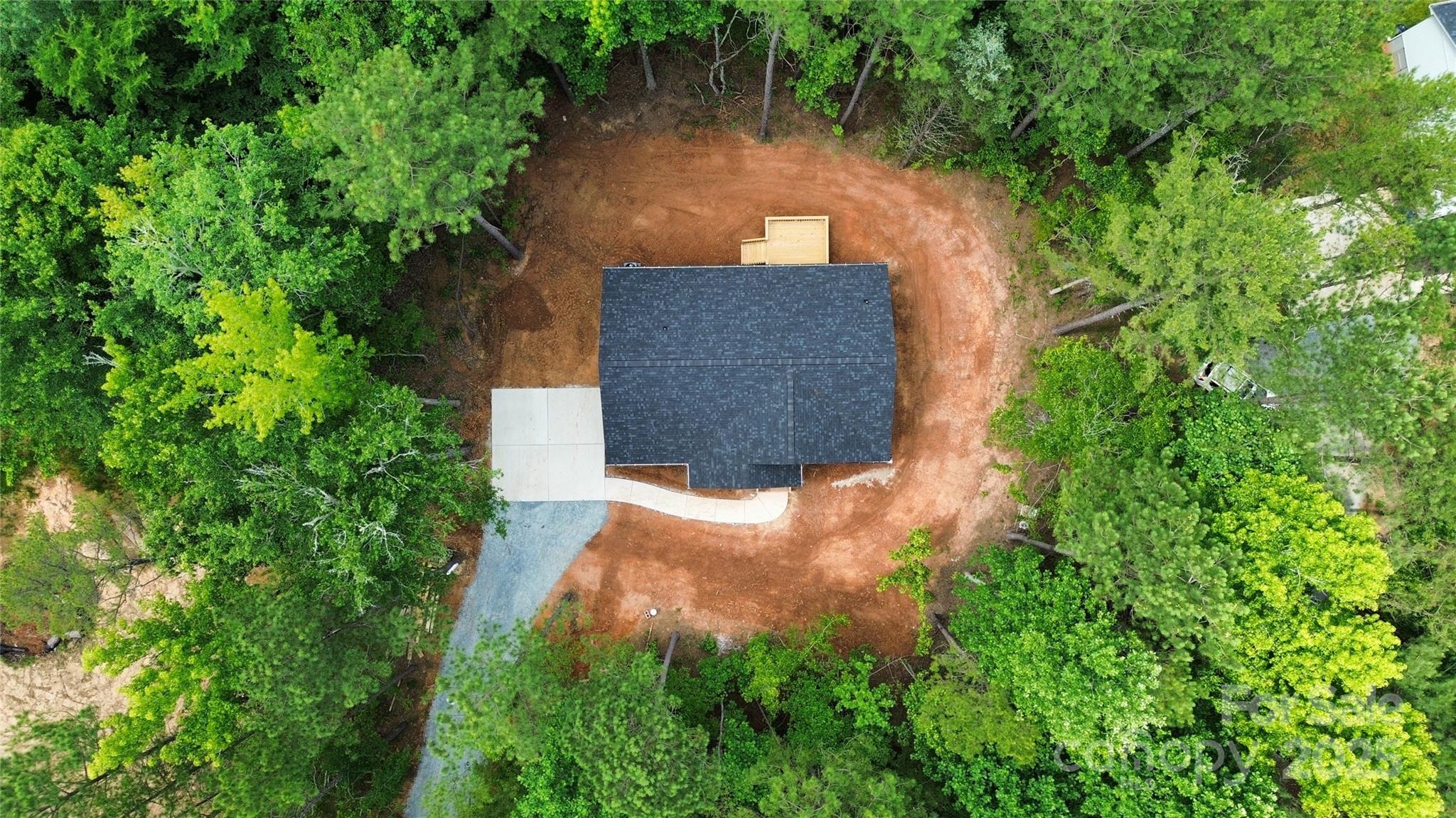 2330 Neill Road Lancaster, SC 29720 - Photo 36 of 39 an aerial view of a house with a yard and large trees