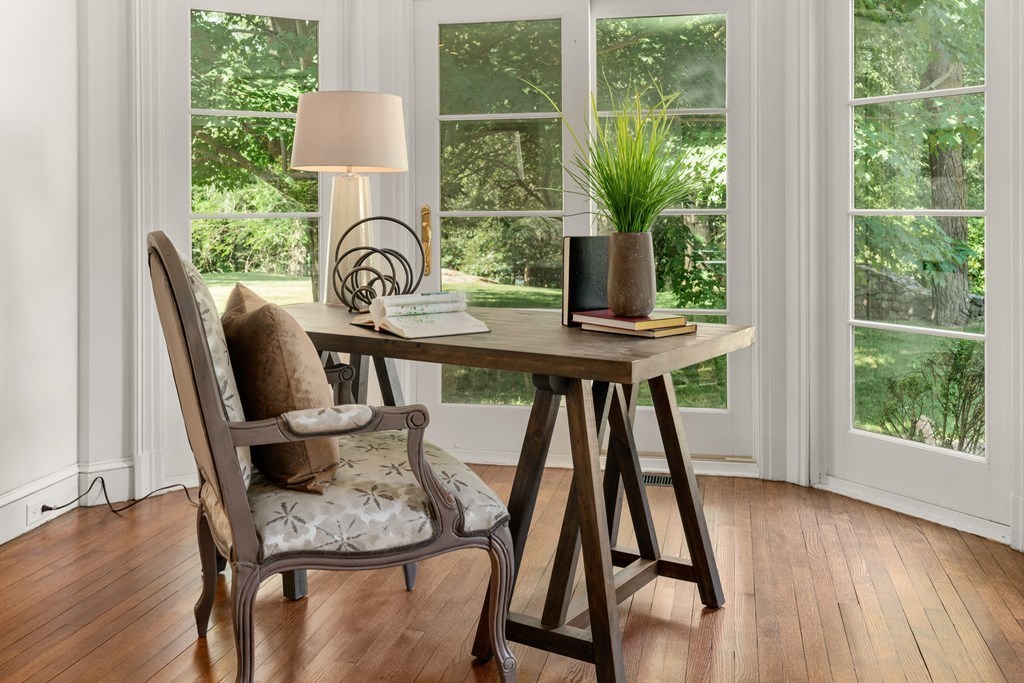 1 Rocky Ridge Road Dedham, MA 02026 - Photo 18 of 38 a view of a deck with furniture and wooden floor