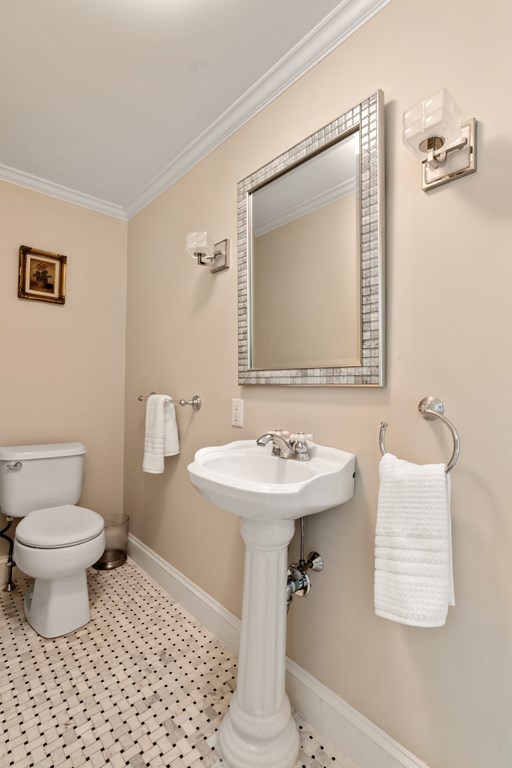 1 Rocky Ridge Road Dedham, MA 02026 - Photo 20 of 38 a bathroom with a sink toilet and a mirror