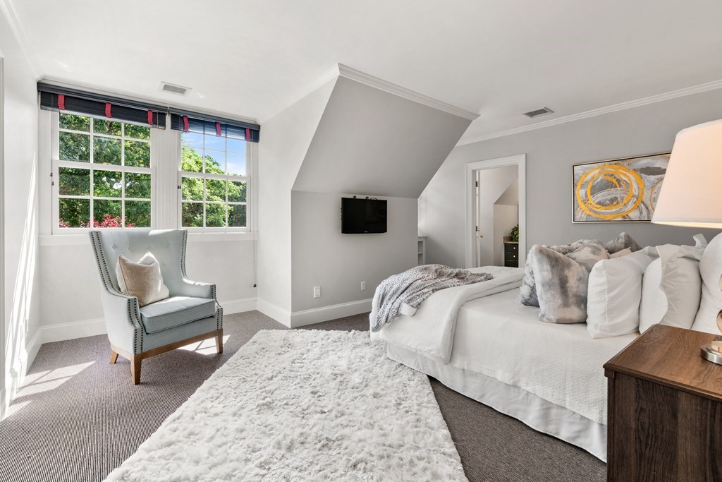 1 Rocky Ridge Road Dedham, MA 02026 - Photo 25 of 38 a bedroom with bed and a large window