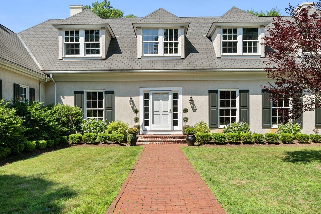 1 Rocky Ridge Road Dedham, MA 02026 - Photo 28 of 38 front view of a brick house with a yard