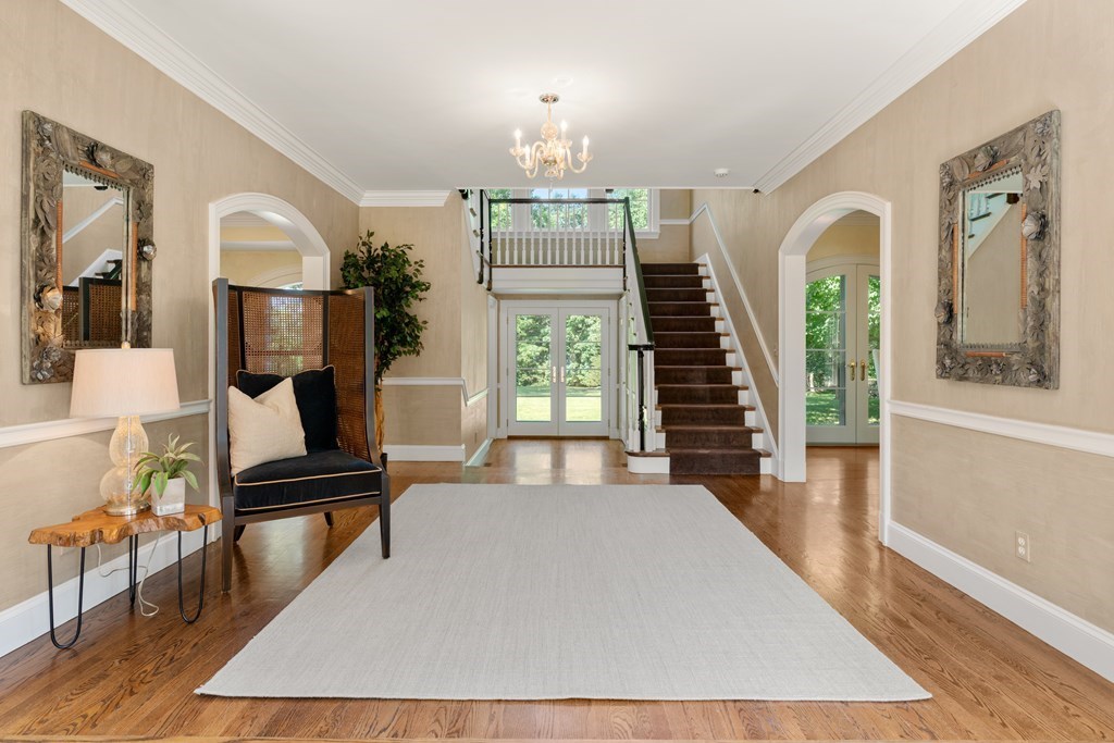 1 Rocky Ridge Road Dedham, MA 02026 - Photo 3 of 38 a living room with furniture and a wooden floor