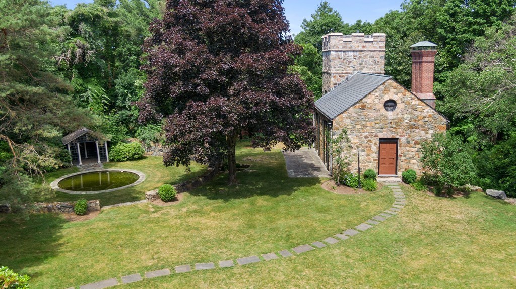 1 Rocky Ridge Road Dedham, MA 02026 - Photo 33 of 38 a front view of a house with yard and green space