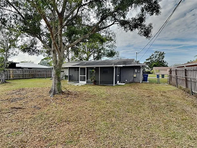 a house with trees in the background