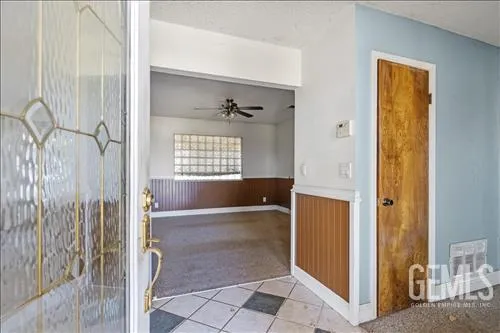 a view of a bathroom with a glass door