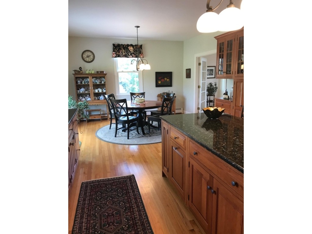186 Chace Hill Road Sterling, MA 01564 - Photo 6 of 22 a kitchen with sink and view of living room