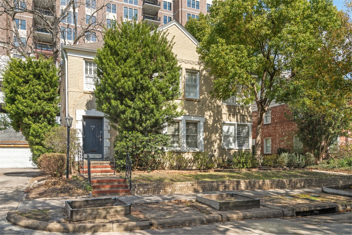 a view of a building with a street