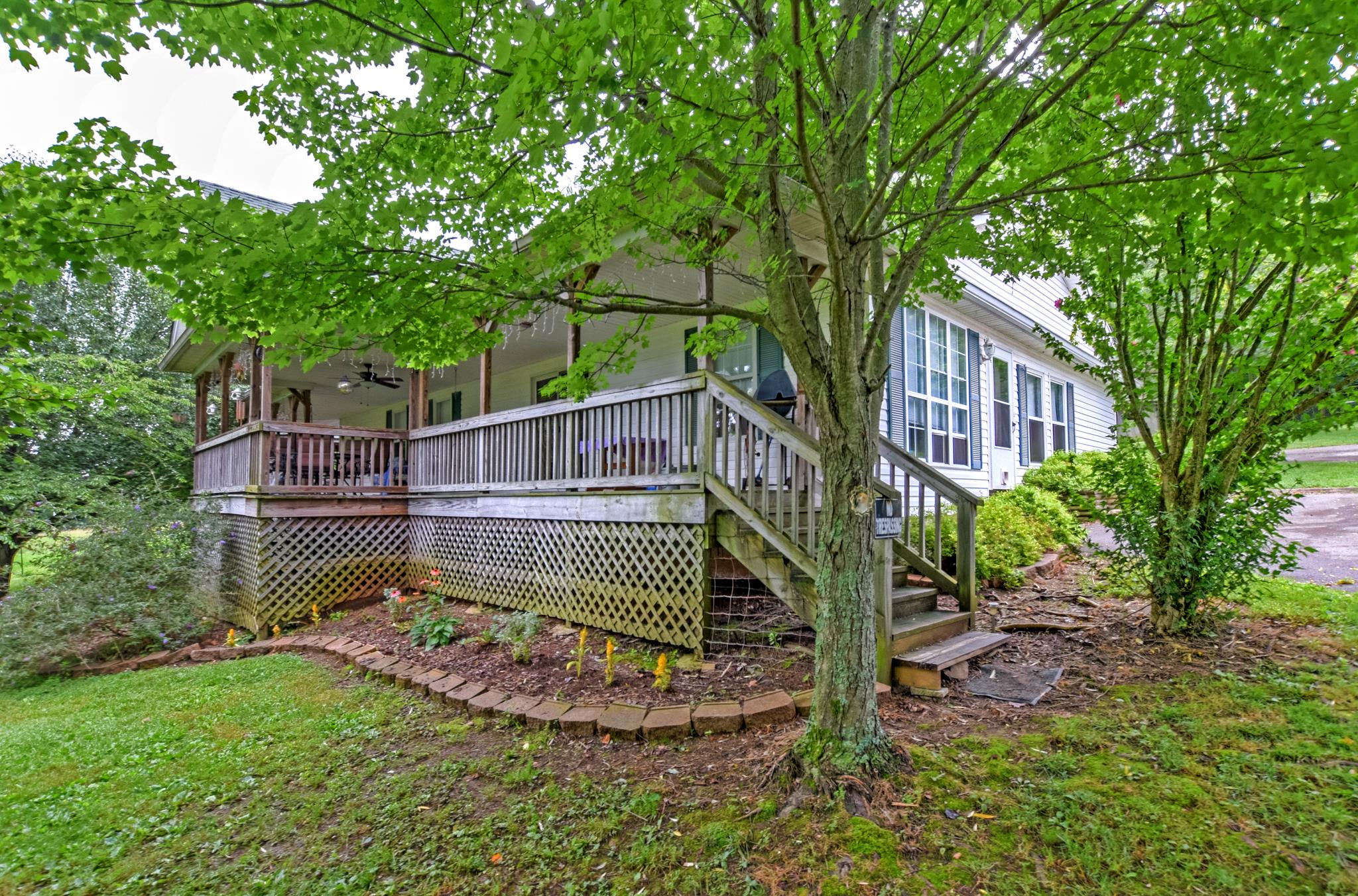 945 Turner Road Watertown, TN 37184 - Photo 5 of 30 a view of a chair and table in the backyard