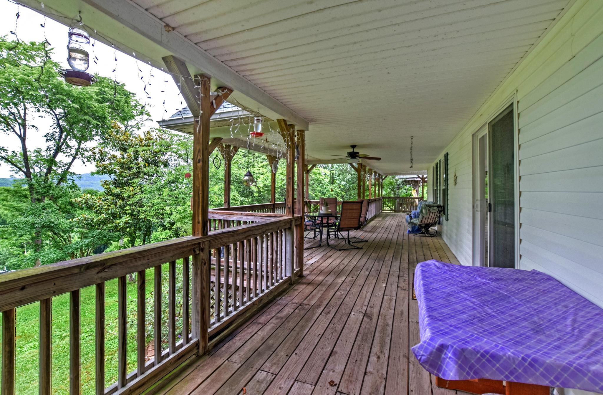 945 Turner Road Watertown, TN 37184 - Photo 6 of 30 a balcony with furniture and wooden floor