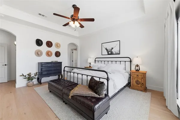 a bed room with a bed and a couch