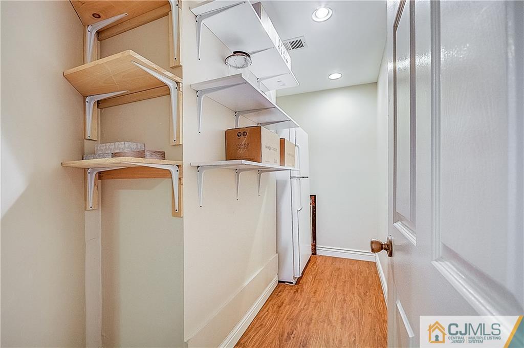 4505 Stonehedge Road Edison, NJ 08820 - Photo 24 of 25 a bathroom with a bathtub and a shower
