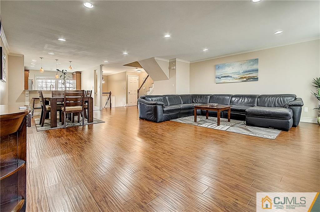 4505 Stonehedge Road Edison, NJ 08820 - Photo 4 of 25 a living room with furniture and wooden floor