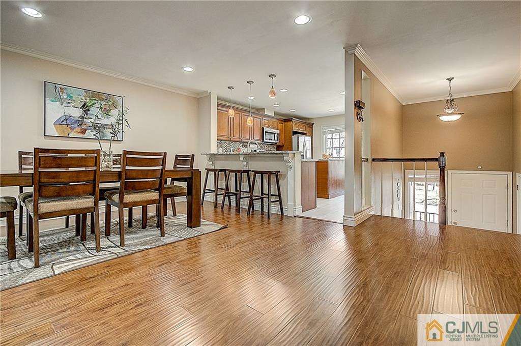 4505 Stonehedge Road Edison, NJ 08820 - Photo 5 of 25 a view of kitchen with furniture and wooden floor