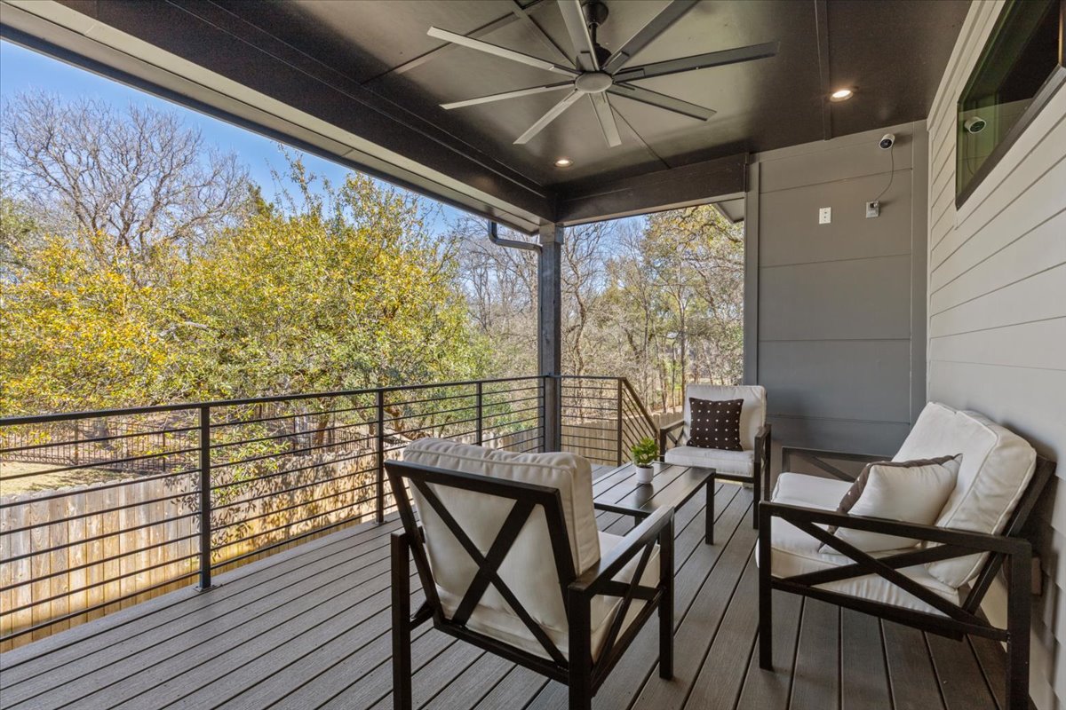 3602 Pennsylvania Avenue, Unit 2 Austin, TX 78721 - Photo 23 of 32 The covered deck is perfect for relaxing evenings or casual outdoor dining.
