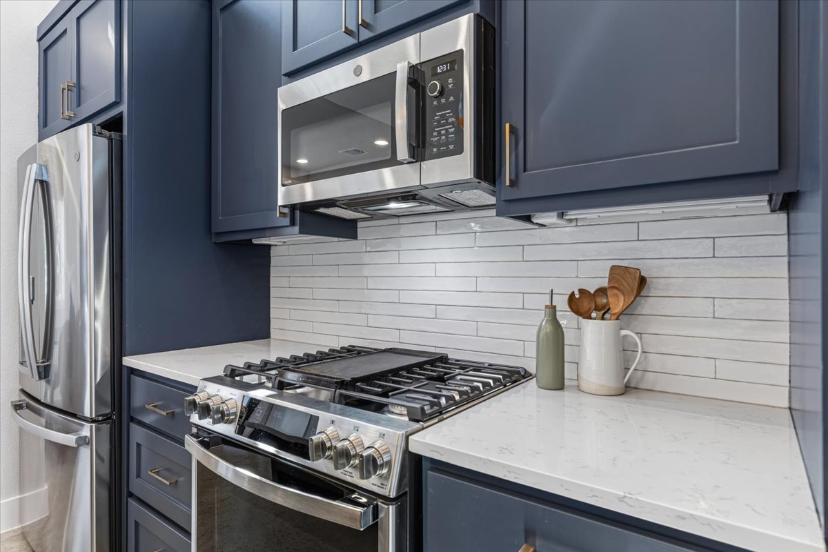 3602 Pennsylvania Avenue, Unit 2 Austin, TX 78721 - Photo 4 of 32 Stylish materials and thoughtful storage make this kitchen both beautiful and functional.