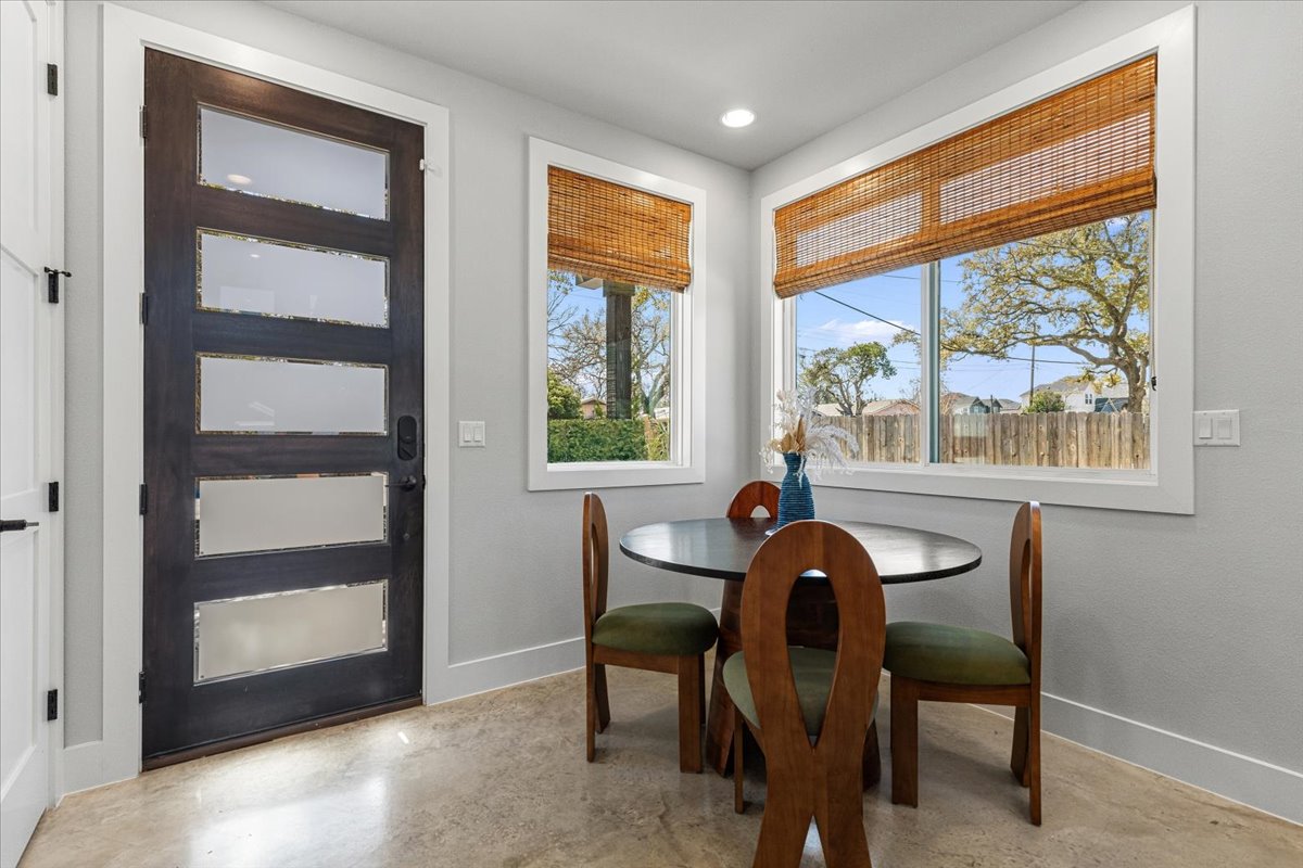 3602 Pennsylvania Avenue, Unit 2 Austin, TX 78721 - Photo 5 of 32 Positioned just off the kitchen, the dining area offers a comfortable setting for both casual dining and gatherings.