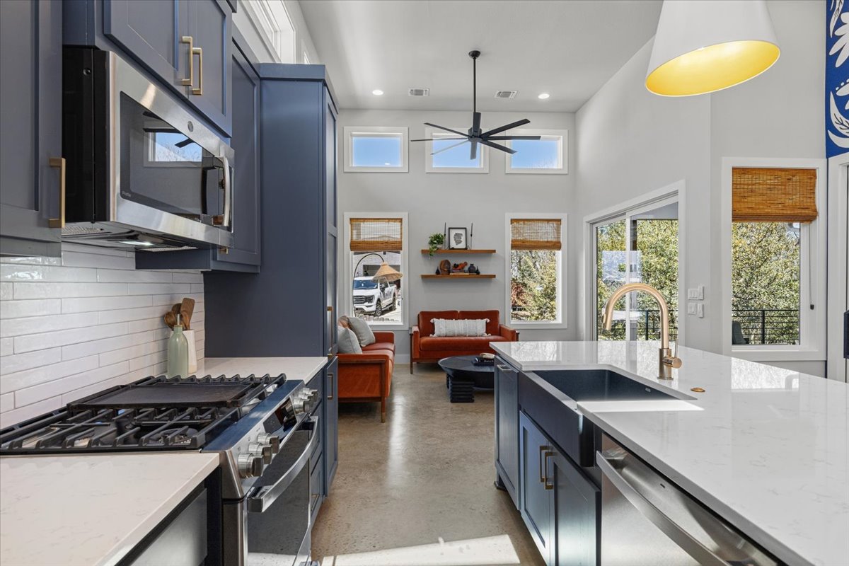 3602 Pennsylvania Avenue, Unit 2 Austin, TX 78721 - Photo 7 of 32 Stainless-steel appliances and sleek finishes create a contemporary cooking space.