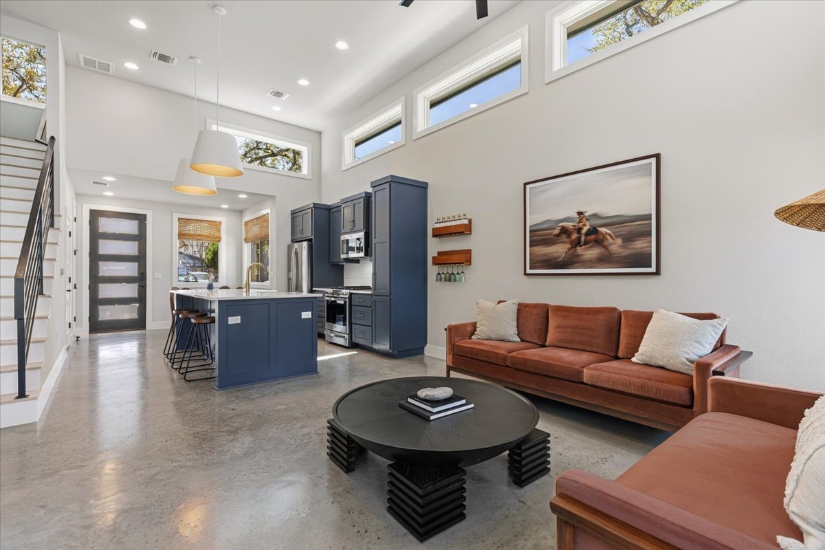 3602 Pennsylvania Avenue, Unit 2 Austin, TX 78721 - Photo 10 of 32 The airy living area flows seamlessly into the kitchen, creating an ideal layout for entertaining.