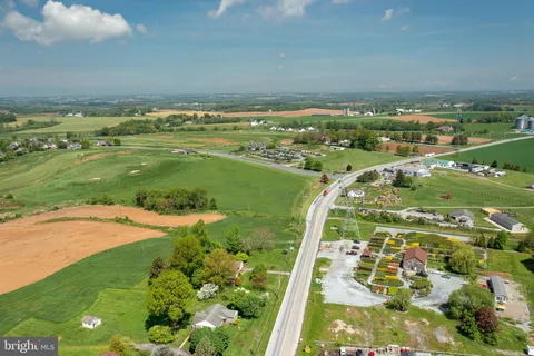 an aerial view of beach and city
