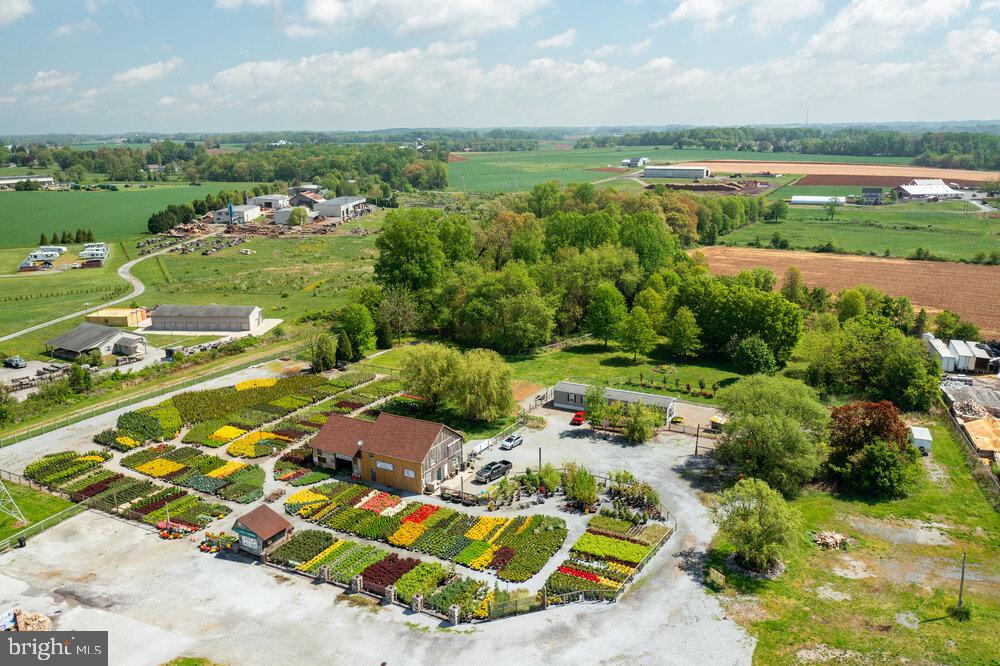 430 Limestone Road Oxford, PA 19363 - Photo 8 of 20 an aerial view of a city with lots of residential buildings and mountain view in back